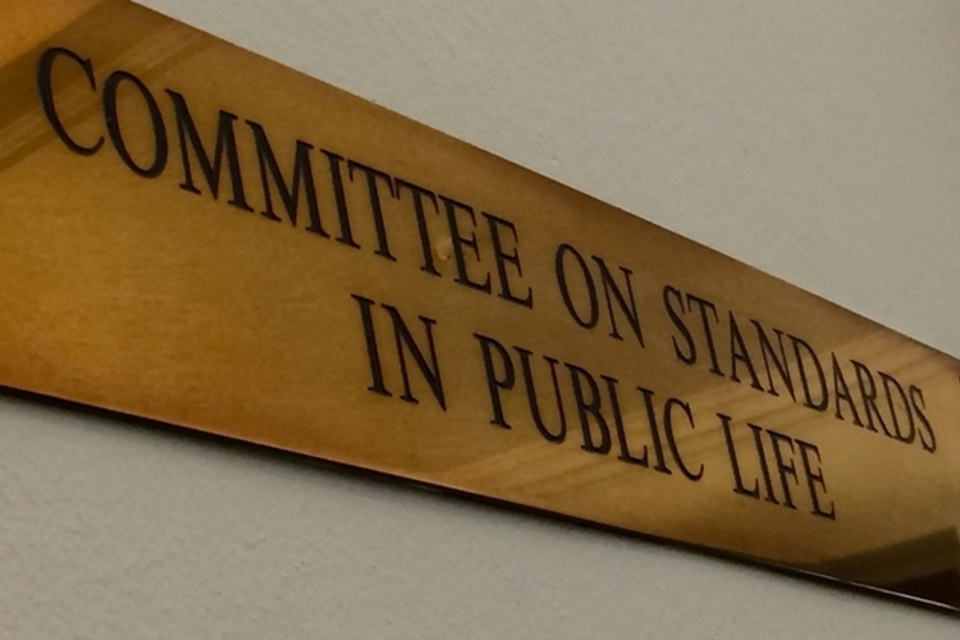 Image of bronze plate with the wording 'committee on standards in public life'