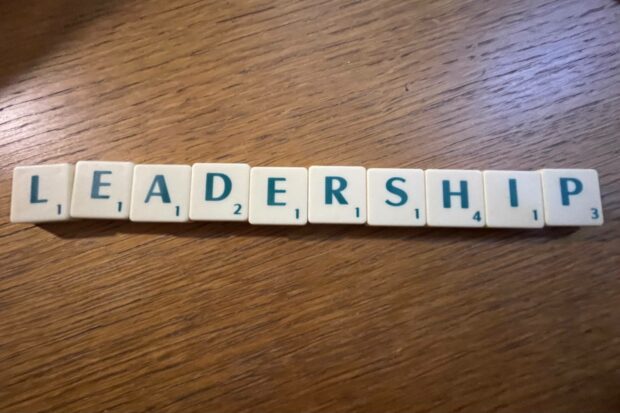 The word 'Leadership' spelled with Scrabble Tiles